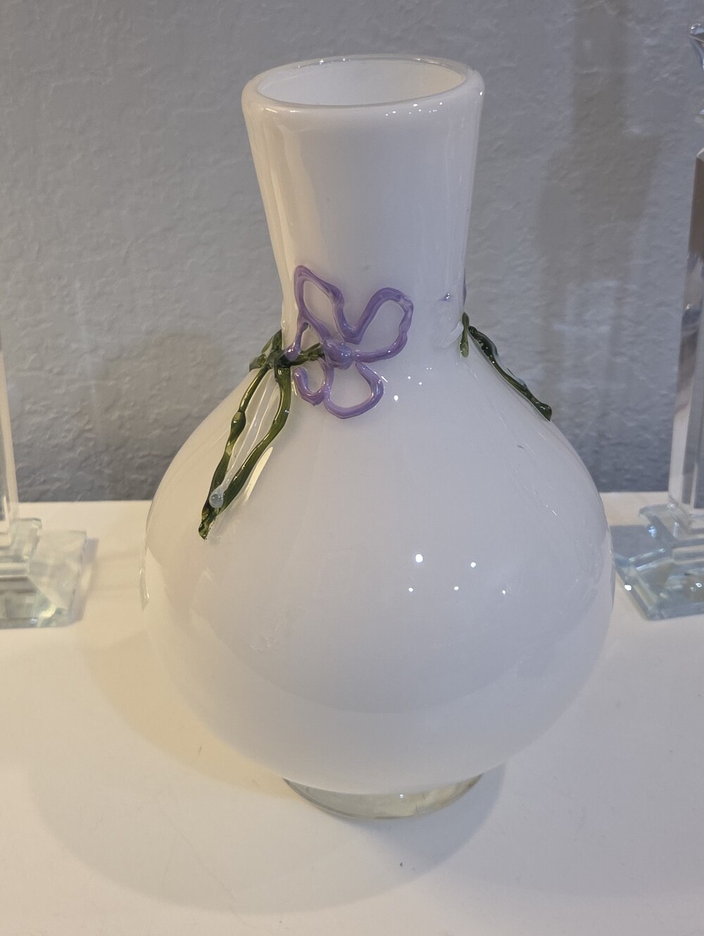 White Glass Vase With Raised Delicate Purple Flowers And Green Vines